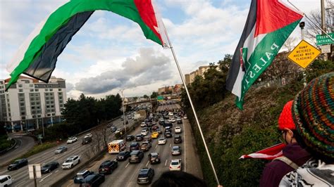 Protesters calling for cease-fire in Israel-Hamas war block traffic in Seattle